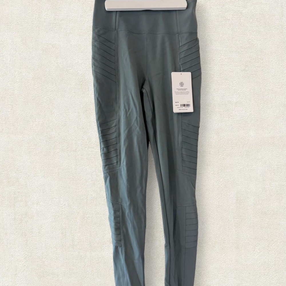 Athleta Delancey Moto Tight in a Green-Gray color.